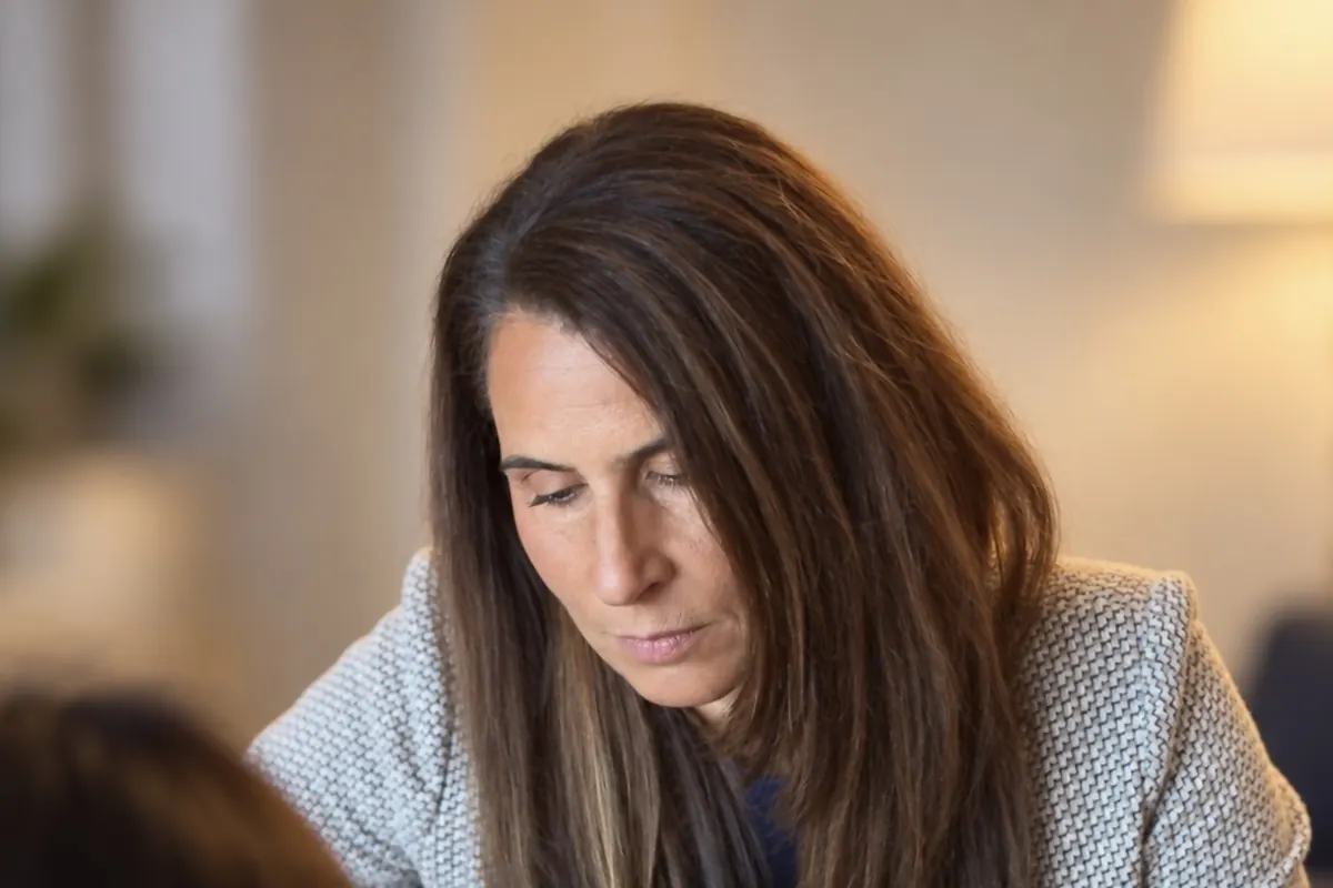 Dr. Samia McCully, ND reviewing a patient's thyroid results
