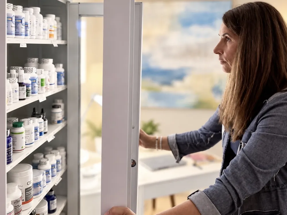 Dr. Samia McCully, ND at the in-office dispensary of her Menlo Park clinic